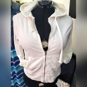 White Mossimo supply company zip-up hoodie.